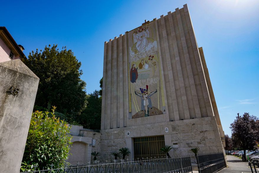 A mosaic by ex-Jesuit artist Marko Rupnik is seen on the main facade of the Church of Our Lady of the Canadian Martyrs, June 28, 2024, in Rome. (AP Photo/Andrew Medichini, File)