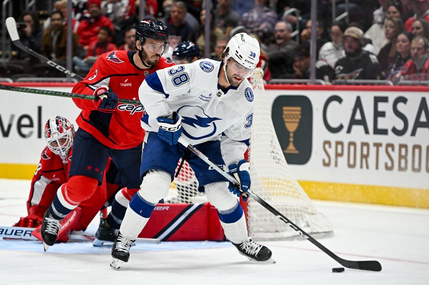Tampa Bay Lightning forward Brandon Hagel (38) with the puck in front of the net during the second period of an NHL game against the Washington Capitals at Capital One Arena in Washington D.C., October 14, 2025. (Photo for the Washington Times)