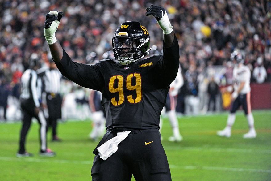 Washington Commanders defensive tackle Javon Kinlaw (99) celebrates after blocking a 48-yard field goal attempt by Chicago Bears kicker Jake Moody (16) at Northwest Stadium in Landover, Maryland, October 13, 2025. (Photo by Brian Murphy for the Washington Times)