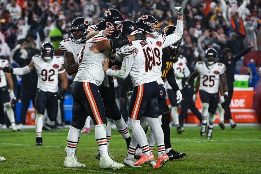 Chicago Bears kicker Jake Moody (16) celebrates with teammates after kicking a game-winning 38-yard field goal at the end of regulation to defeat the Washington Commanders 25-24 at Northwest Stadium in Landover, Maryland, October 13, 2025. (Photo by Brian Murphy for the Washington Times)