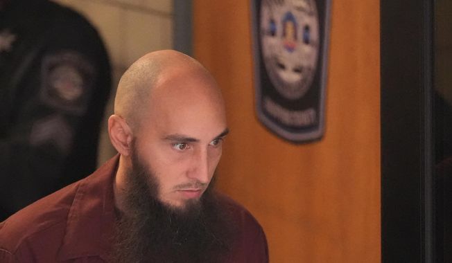 Cody Balmer, accused of setting a fire at Pennsylvania Gov. Josh Shapiro's official residence, leaves Dauphin County Courthouse on Tuesday, Oct. 14, 2025 in Harrisburg, Pa. (AP Photo/Matt Slocum)