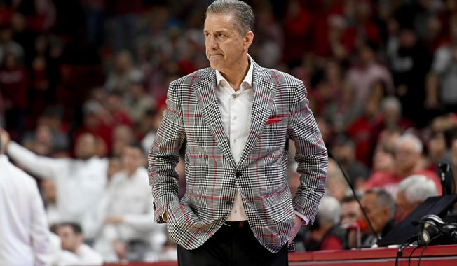 FILE - Arkansas coach John Calipari stands on the sidelines against Mississippi State during an NCAA college basketball game, March 8, 2025, in Fayetteville, Ark. (AP Photo/Michael Woods, File)