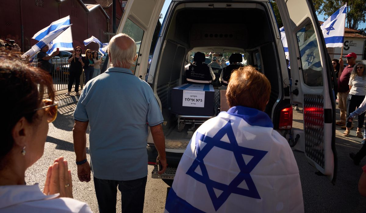 NextImg:Israeli says one of the bodies handed over by Hamas is not that of a hostage