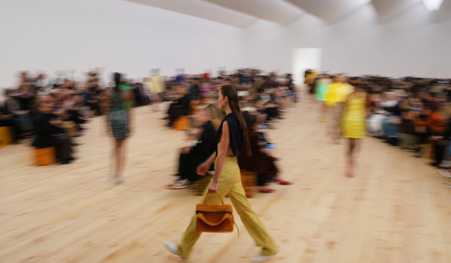 FILE - A model wears a creation as part of the Loewe Spring/Summer 2026 collection presented in Paris, on Oct. 3, 2025. (AP Photo/Aurelien Morissard, File)