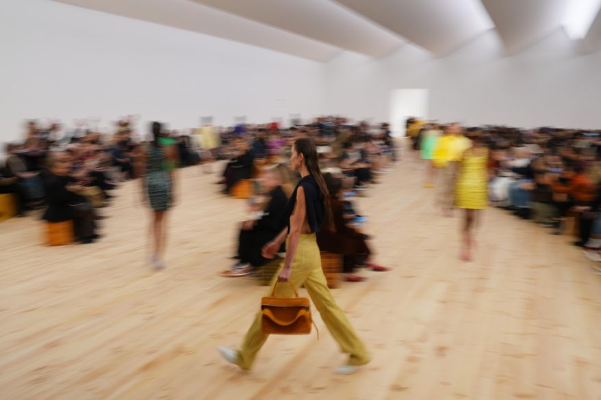 FILE - A model wears a creation as part of the Loewe Spring/Summer 2026 collection presented in Paris, on Oct. 3, 2025. (AP Photo/Aurelien Morissard, File)