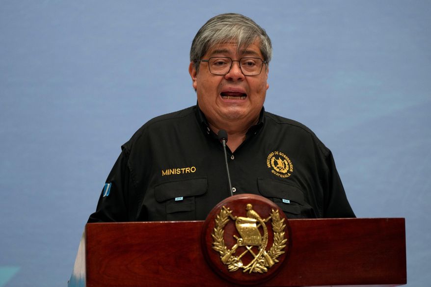 Guatemalan Interior Minister Francisco Jimenez gives a press conference at the National Palace in Guatemala City, Monday, Oct. 13, 2025, after authorities confirmed the escape of 20 members from the Barrio 18 gang from a maximum security prison. (AP Photo/Moises Castillo)