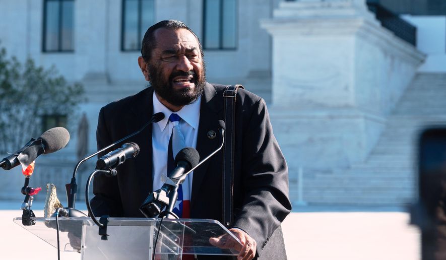 Rep. Al Green, D-Texas, speaks to voting rights activists outside the Supreme Court in Washington, early Wednesday, Oct. 15, 2025, as the justices prepare to take up a major Republican-led challenge to the Voting Rights Act, the centerpiece legislation of the Civil Rights Movement. (AP Photo/Cliff Owen)