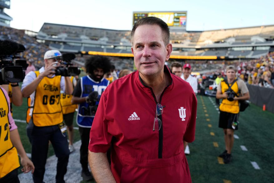 Indiana head coach Curt Cignetti walks off the field after an NCAA college football game against Iowa, Saturday, Sept. 27, 2025, in Iowa City, Iowa. (AP Photo/Charlie Neibergall)
