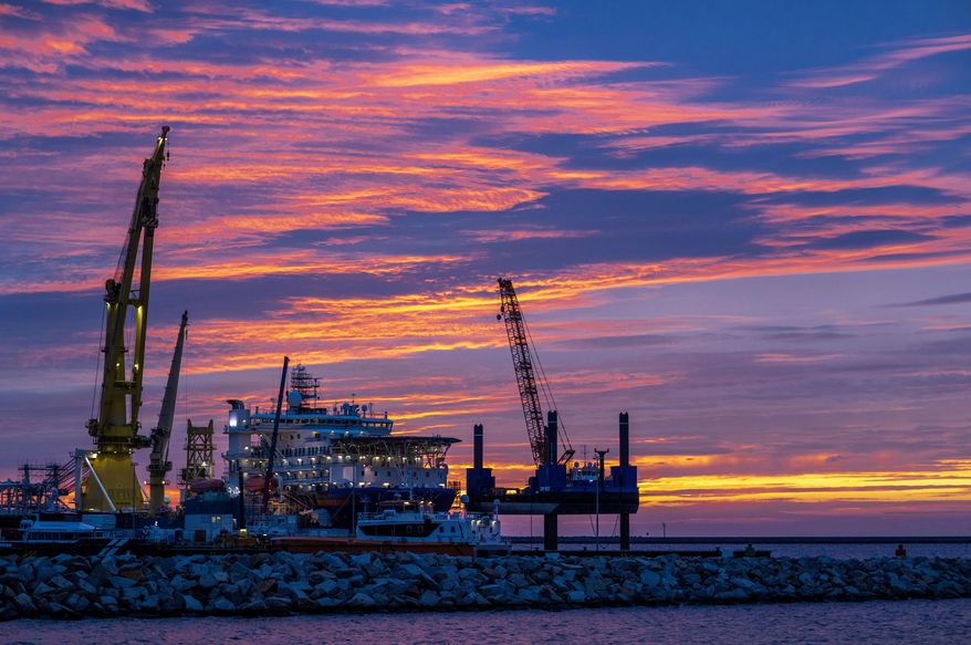 FILE - The Russian pipe-laying ship 'Akademik Tscherski' which is on deployment for the further construction of the Nord Stream 2 Baltic Sea pipeline is moored at the port of Mukran on the island of Ruegen, Germany, Tuesday, Sept. 8, 2020. (Jens Buettner/dpa via AP, File)