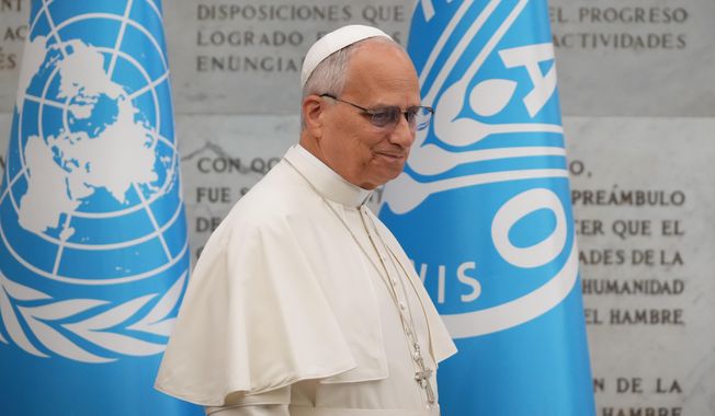 Pope Leo XIV leaves the Global World Food Day Ceremony in Rome, Thursday, Oct. 16, 2025. (AP Photo/Alessandra Tarantino)