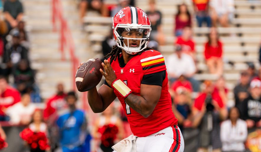 Maryland quarterback Malik Washington (7 ) throws a pass against Nebraska during the first half of a NCAA college football game, Saturday, Oct. 11, 2025, in College Park, Md. (Jordan Sabillo/All-Pro Reels)