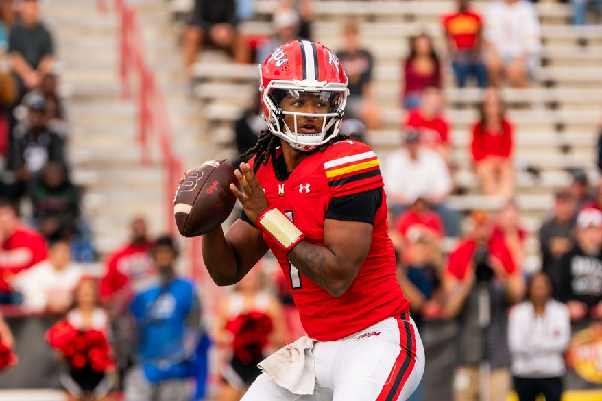 Maryland quarterback Malik Washington (7 ) throws a pass against Nebraska during the first half of a NCAA college football game, Saturday, Oct. 11, 2025, in College Park, Md. (Jordan Sabillo/All-Pro Reels)
