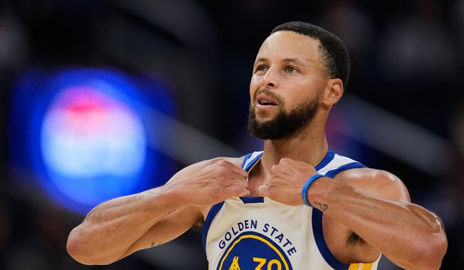 Golden State Warriors guard Stephen Curry reacts during the first half of an NBA basketball preseason game against the Portland Trail Blazers, Wednesday, Oct. 8, 2025, in San Francisco. (AP Photo/Godofredo A. Vásquez)