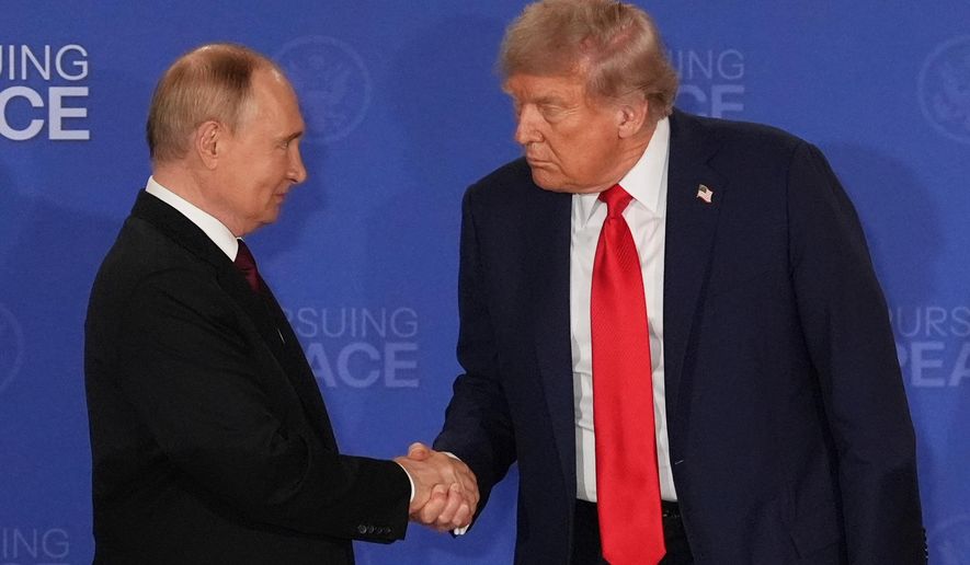 FILE - President Donald Trump, right, shakes the hand of Russia's President Vladimir Putin during a joint press conference at Joint Base Elmendorf-Richardson, Alaska, Aug. 15, 2025. (AP Photo/Jae C. Hong, File)