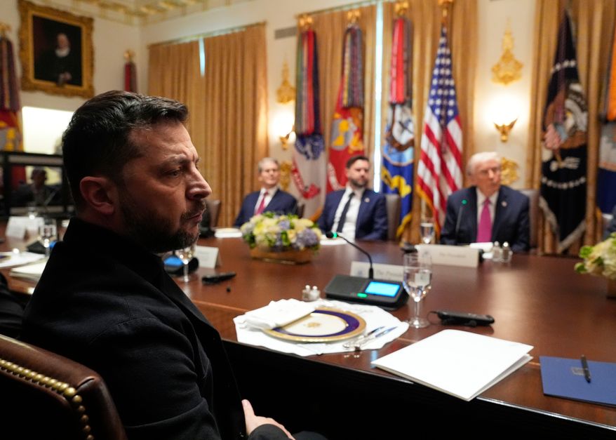 Ukraine's President Volodymyr Zelenskyy, left, speaks before a lunch with President Donald Trump, from right, Vice President JD Vance and Treasury Secretary Scott Bessent in the Cabinet Room of the White House, Friday, Oct. 17, 2025, in Washington. (AP Photo/Alex Brandon)