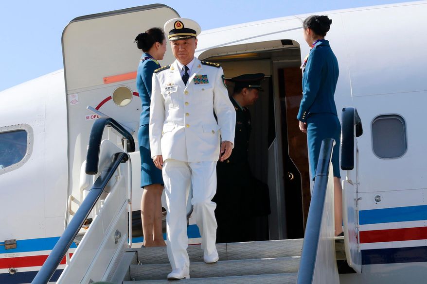 Miao Hua, China's director of the political affairs department of the Central Military Commission, arrives at the Pyongyang Airport in Pyongyang, North Korea, Oct. 14, 2019. (AP Photo/Cha Song Ho, File)