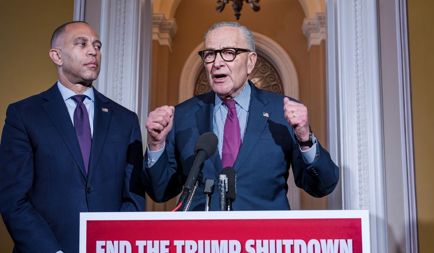 House Minority Leader Hakeem Jeffries, D-N.Y., left, and Senate Minority Leader Chuck Schumer, D-N.Y., speak to reporters outside the Senate chamber as they charge President Donald Trump and the Republicans with the government shutdown, at the Capitol in Washington, Thursday, Oct. 16, 2025. (AP Photo/J. Scott Applewhite)