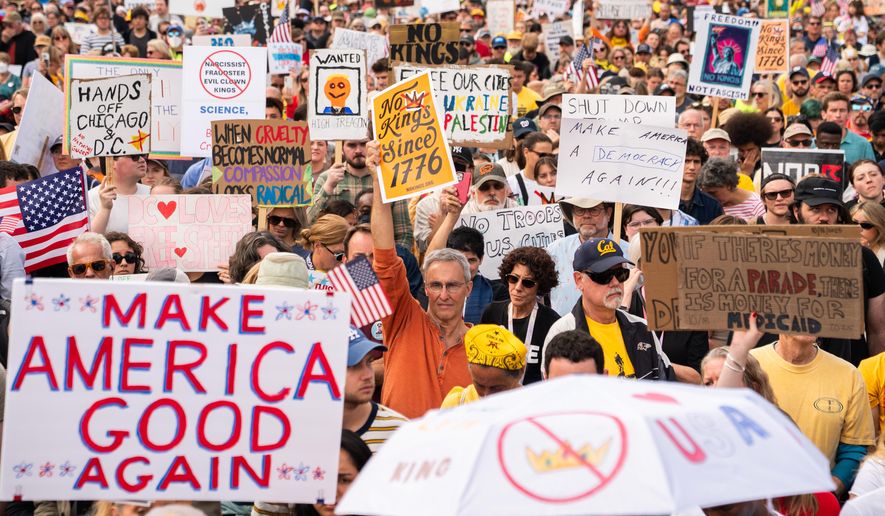 Crowds gather to listen to Sen. Bernie Sanders, I-Vt., during a No Kings protest, Saturday, Oct. 18, 2025, in Washington. (AP Photo/Allison Robbert)