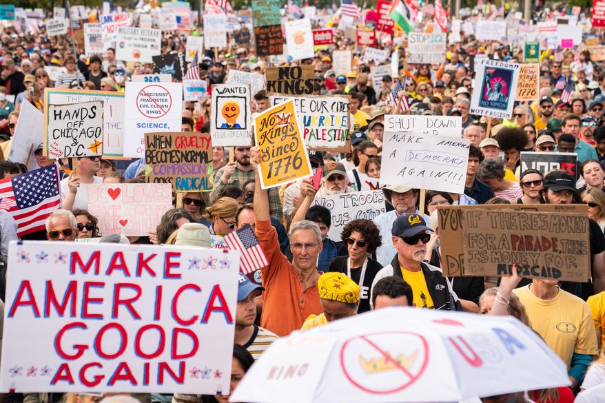 Crowds gather to listen to Sen. Bernie Sanders, I-Vt., during a No Kings protest, Saturday, Oct. 18, 2025, in Washington. (AP Photo/Allison Robbert)
