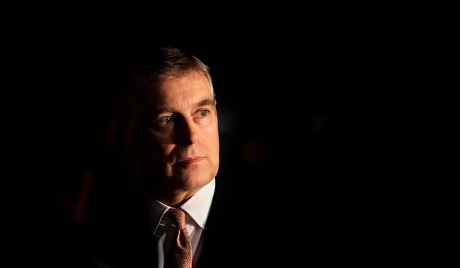 Britain's Prince Andrew looks on during an event at the residence of the British Ambassador in New Delhi, India, March 10, 2010. (AP Photo/Manish Swarup, File)