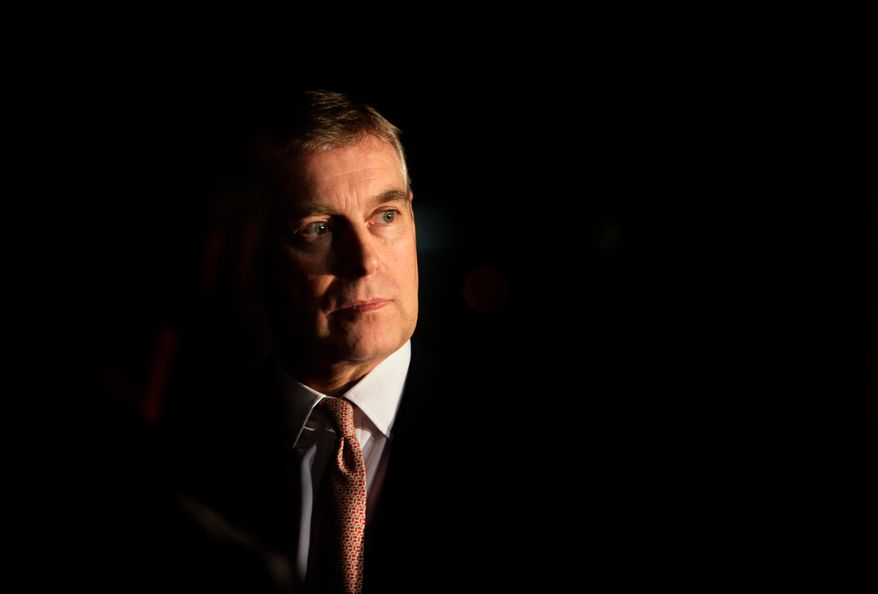 Britain's Prince Andrew looks on during an event at the residence of the British Ambassador in New Delhi, India, March 10, 2010. (AP Photo/Manish Swarup, File)