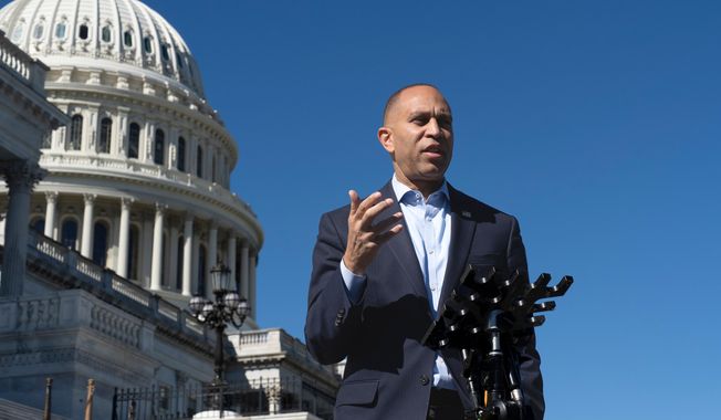 House Minority Leader Hakeem Jeffries, D-N.Y., speaks to reporters on the House steps on day 16 of the government shutdown, at the Capitol in Washington, Thursday, Oct. 16, 2025. (AP Photo/J. Scott Applewhite)