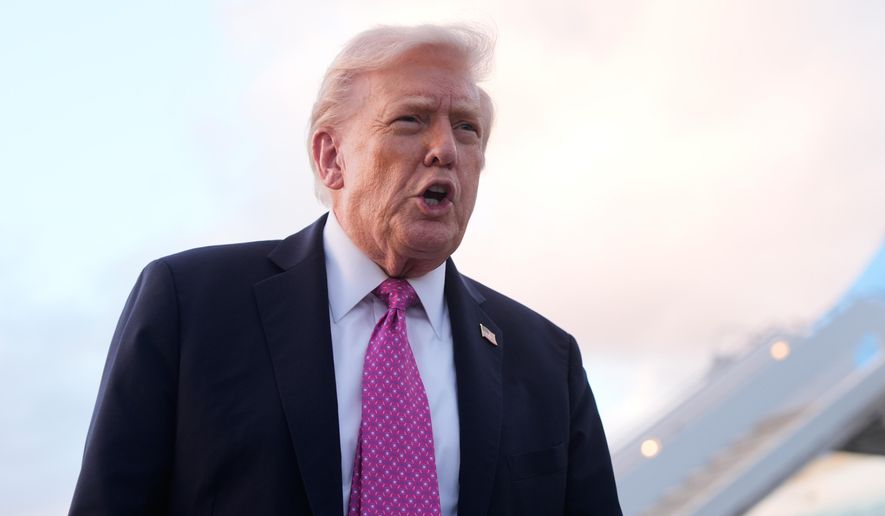 President Donald Trump speaks to reporters after arriving on Air Force One, Friday, Oct. 17, 2025, at Palm Beach International Airport in West Palm Beach, Fla. (AP Photo/Mark Schiefelbein)