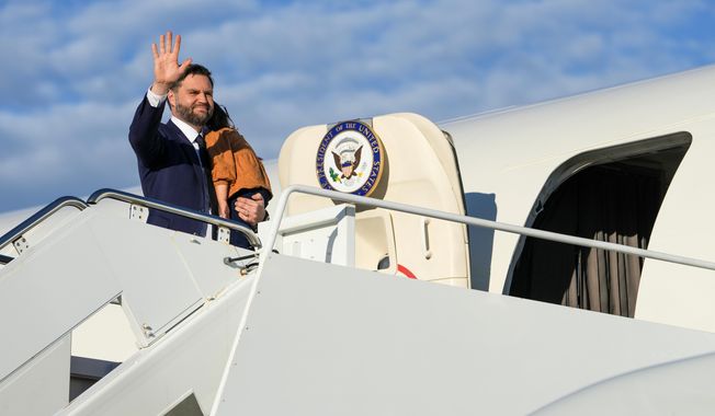 Vice President JD Vance waves as he boards Air Force Two at Joint Base Andrews, Md., Friday, Oct. 17, 2025. (Oliver Contreras/Pool via AP)