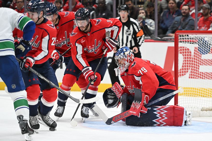 Washington Capitals goalie Charlie Lindgren (79) watching the play develop in front of him during the second period of an NHL game against the Vancouver Canucks at Capital One Arena in Washington D.C., October 19, 2025. (Photo for the Washington Times)