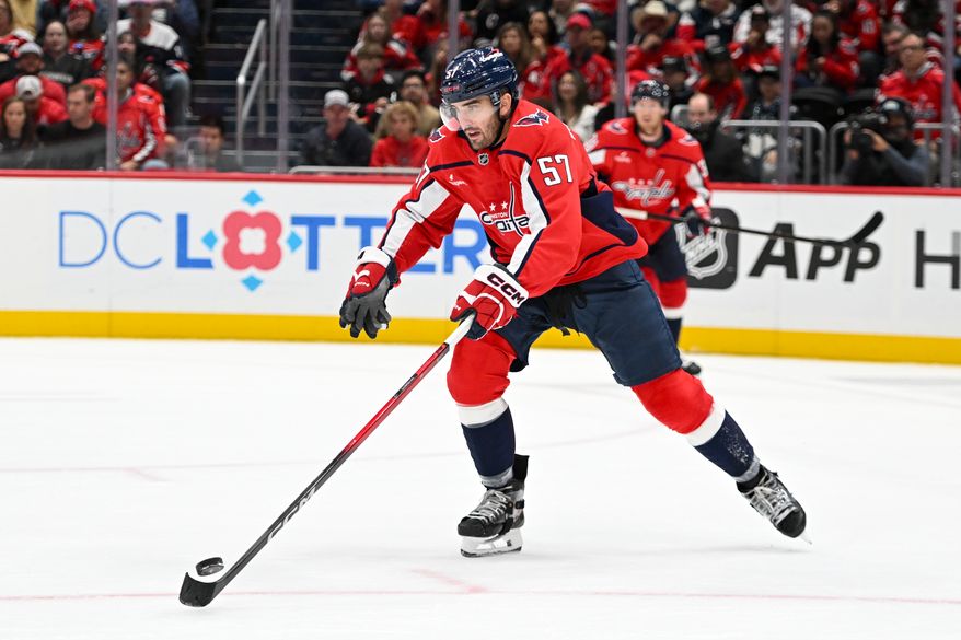Washington Capitals defenseman Trevor van Riemsdyk (57) skating the puck up ice during the second period of an NHL game against the Vancouver Canucks at Capital One Arena in Washington D.C., October 19, 2025. (Photo for the Washington Times)