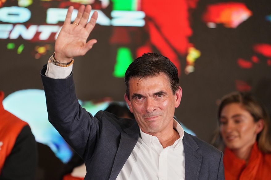 Presidential candidate Rodrigo Paz addresses supporters after preliminary results showed him leading in the presidential runoff election in La Paz, Bolivia, Sunday, Oct. 19, 2025. (AP Photo/Natacha Pisarenko)