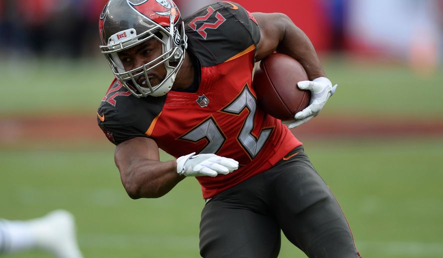 FILE - Tampa Bay Buccaneers running back Doug Martin (22) during the second half of an NFL football game against the New York Jets Sunday, Nov. 12, 2017, in Tampa, Fla. (AP Photo/Jason Behnken,File)