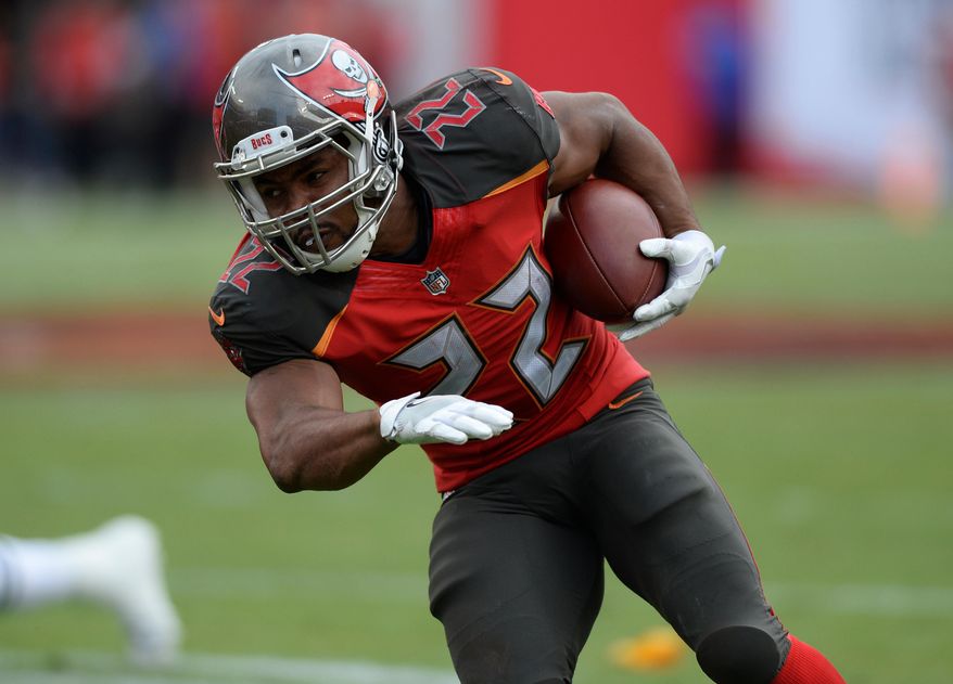 FILE - Tampa Bay Buccaneers running back Doug Martin (22) during the second half of an NFL football game against the New York Jets Sunday, Nov. 12, 2017, in Tampa, Fla. (AP Photo/Jason Behnken,File)
