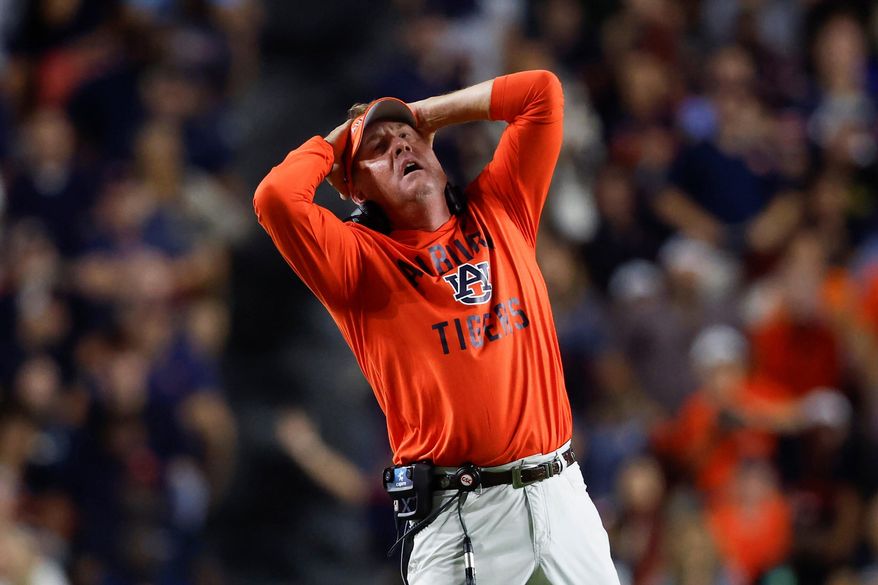 Auburn head coach Hugh Freeze reacts to a call during the second half of an NCAA college football game against Missouri, Saturday, Oct. 18, 2025, in Auburn, Ala. (AP Photo/Butch Dill)