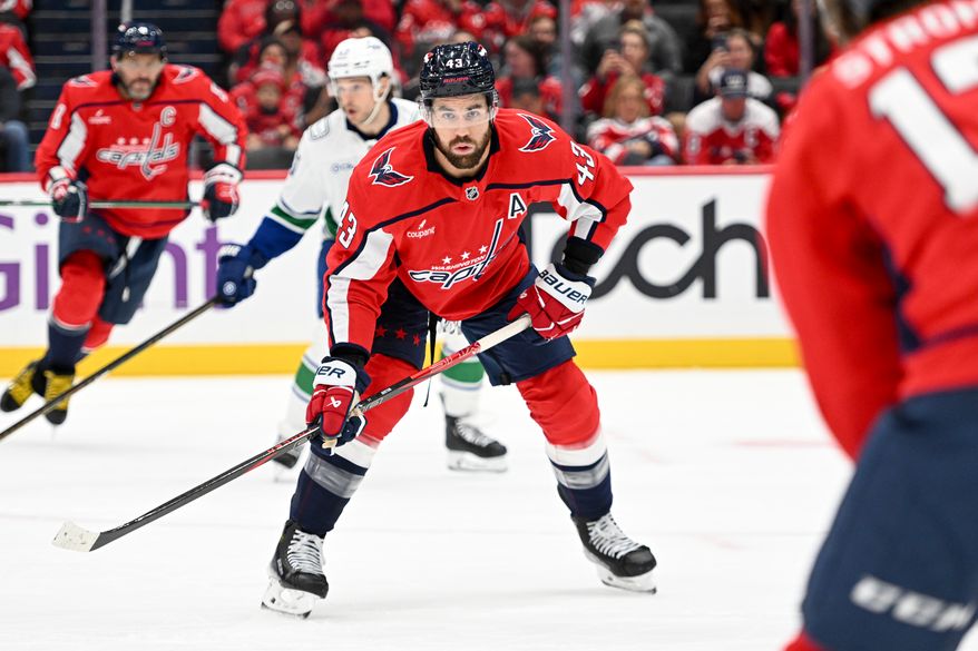 Washington Capitals right wing Tom Wilson (43) tracking the puck during the first period of an NHL game against the Vancouver Canucks at Capital One Arena in Washington D.C., October 19, 2025. (Photo for the Washington Times)