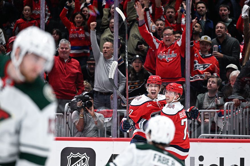 Washington Capitals center Dylan Strome (17) celebrates with left wing Anthony Beauvillier (72) after netting his second goal of the night against the Minnesota Wild at Capital One Arena, Washington, D.C., October 17, 2025. (Photo by Brian Murphy for the Washington Times)
