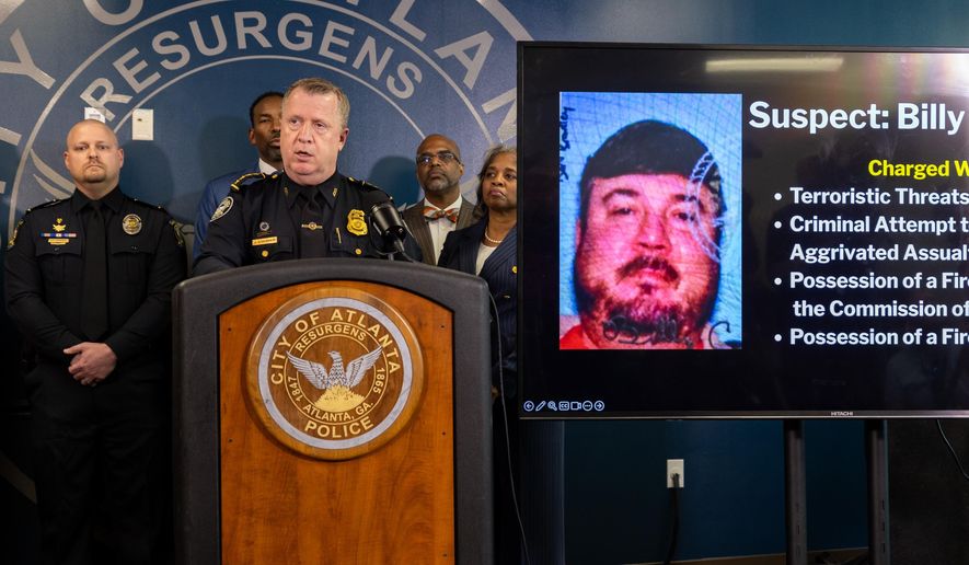 Atlanta Police Chief Darin Schierbaum speaks during a press conference at the Atlanta Police Department headquarters in Atlanta on Monday, October 20, 2025, regarding a Cartersville man, Billy Cagle, who threatened to "shoot up" the airport. (Arvin Temkar/Atlanta Journal-Constitution via AP)