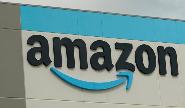 The Amazon logo is pictured at the Amazon Robotic Sorting Fulfillment Center in Madison County, Miss., Aug. 11, 2022. (AP Photo/Rogelio V. Solis, File)