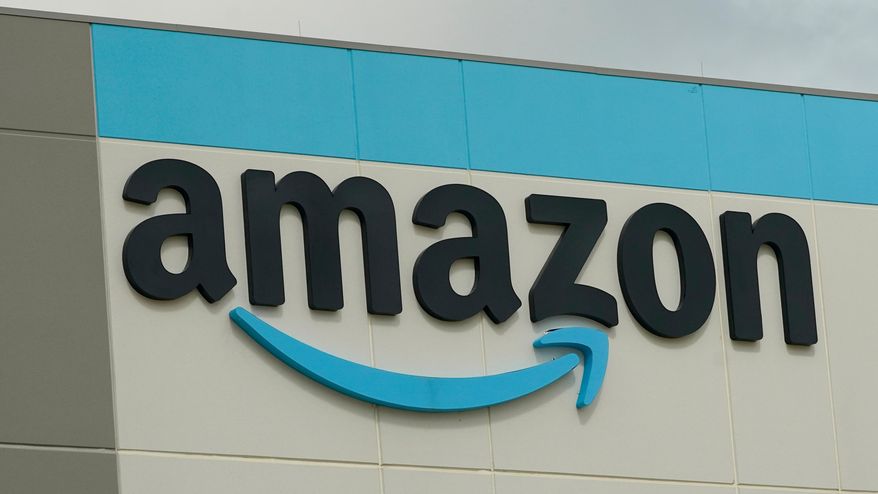 The Amazon logo is pictured at the Amazon Robotic Sorting Fulfillment Center in Madison County, Miss., Aug. 11, 2022. (AP Photo/Rogelio V. Solis, File)
