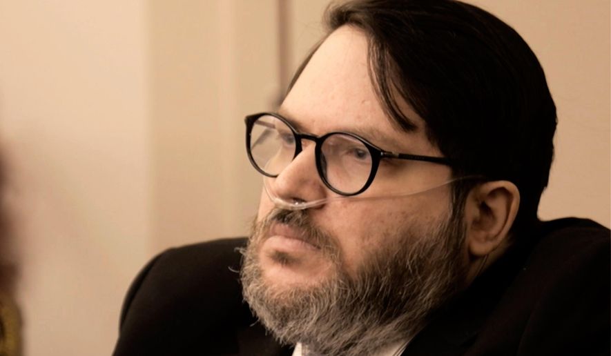 FILE - In this image made from pool video footage, Nicholas Rossi, accused of faking his death and fleeing to Europe to avoid rape charges, appears at a jury trial in Salt Lake City, Aug. 11, 2025. (Firecrest Films via AP, Pool, File)