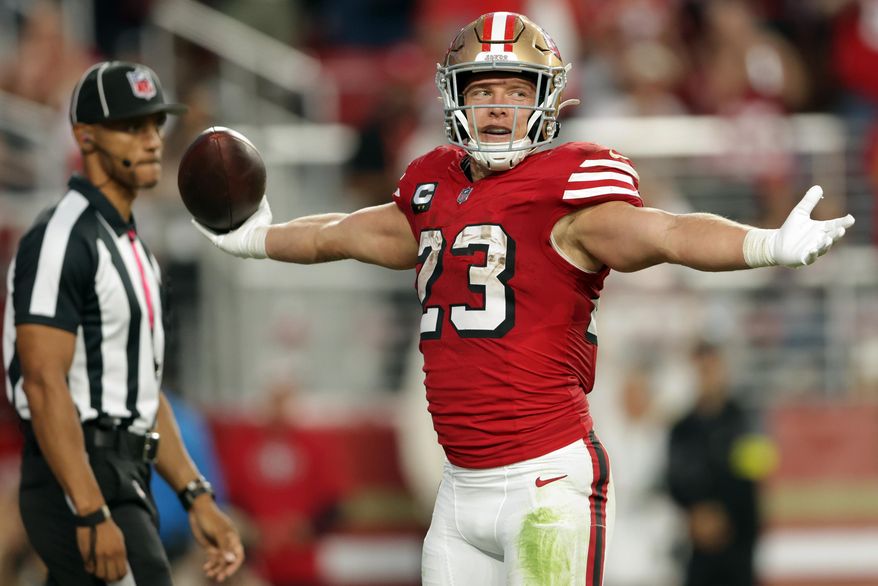 San Francisco 49ers' Christian McCaffrey celebrates a second-quarter touchdown run against the Atlanta Falcons during an NFL football game in Santa Clara, Calif., on Sunday, Oct. 19, 2025. (Scott Strazzantez/San Francisco Chronicle via AP)