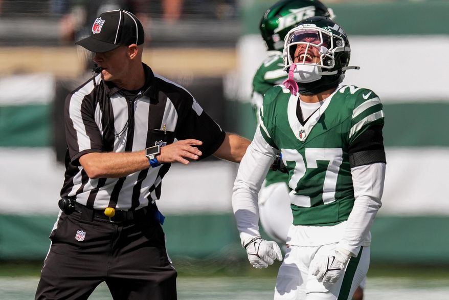 New York Jets safety Malachi Moore (27) reacts after a defensive play against the Carolina Panthers during the second quarter of an NFL football game, Sunday, Oct. 19, 2025, in East Rutherford, N.J. (AP Photo/Seth Wenig)
