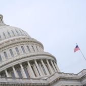 The American flag flies atop the Capitol Building, Monday, Sept. 29, 2025, in Washington. (AP Photo/Mariam Zuhaib)