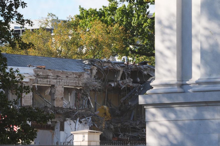 Work begins on the demolition of a part of the East Wing of the White House, Monday, Oct. 20, 2025, in Washington, before construction of a new ballroom. (AP Photo/Evan Vucci)