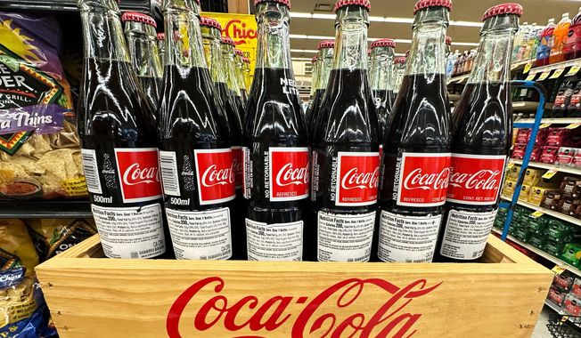 Bottles of Mexican Coca-Cola are displayed at a grocery store in Mount Prospect, Ill., Thursday, July 17, 2025. (AP Photo/Nam Y. Huh) **FILE**