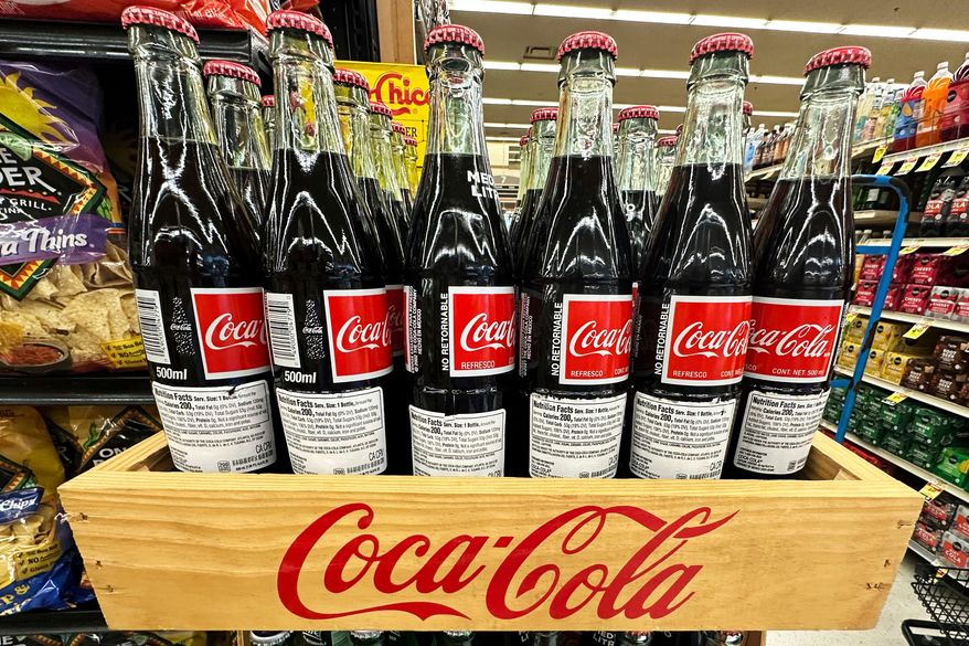 Bottles of Mexican Coca-Cola are displayed at a grocery store in Mount Prospect, Ill., Thursday, July 17, 2025. (AP Photo/Nam Y. Huh) **FILE**