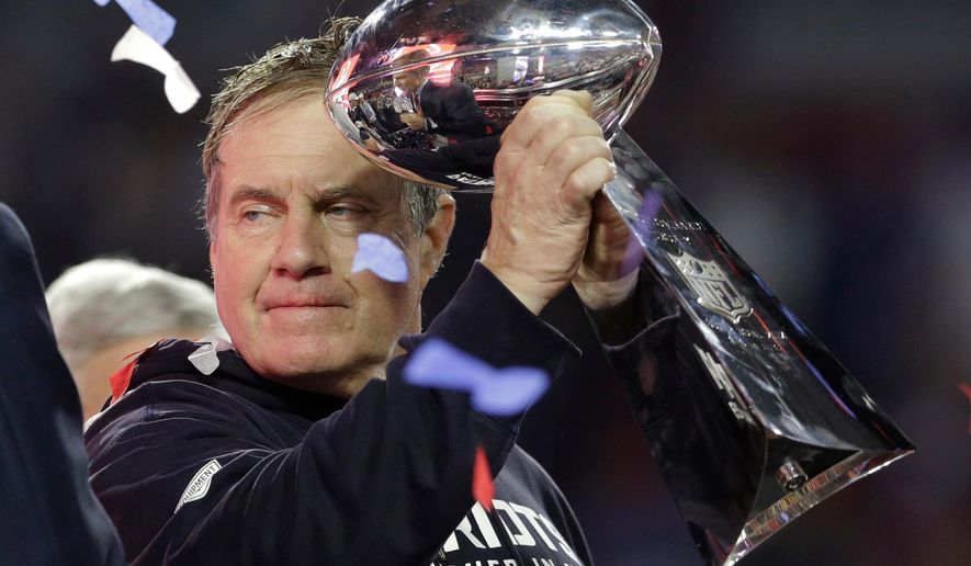 FILE - New England Patriots head coach Bill Belichick holds up the Vince Lombardi Trophy as he celebrates after the Patriots defeated the Seattle Seahawks 28-24 in NFL Super Bowl XLIX football game Sunday, Feb. 1, 2015, in Glendale, Ariz. (AP Photo/Patrick Semansky, File)