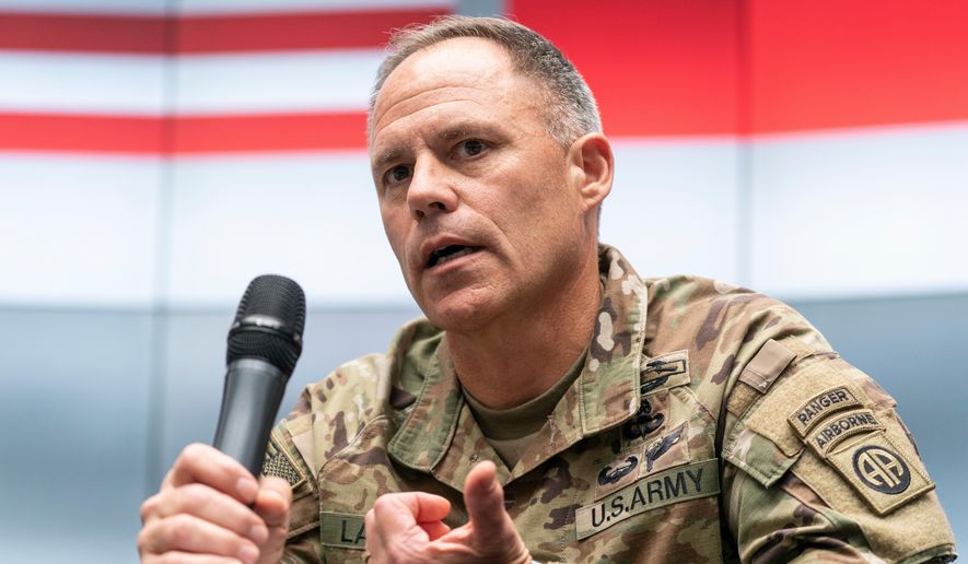 FILE - U.S. Army Maj. Gen. Christopher LaNeve, Commanding General, 82nd Airborne Division, speaks with reporters, April 24, 2022, in Poland near the Ukraine border. (AP Photo/Alex Brandon, Pool)