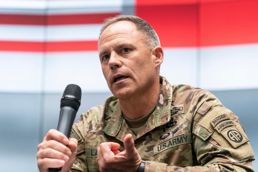 FILE - U.S. Army Maj. Gen. Christopher LaNeve, Commanding General, 82nd Airborne Division, speaks with reporters, April 24, 2022, in Poland near the Ukraine border. (AP Photo/Alex Brandon, Pool)