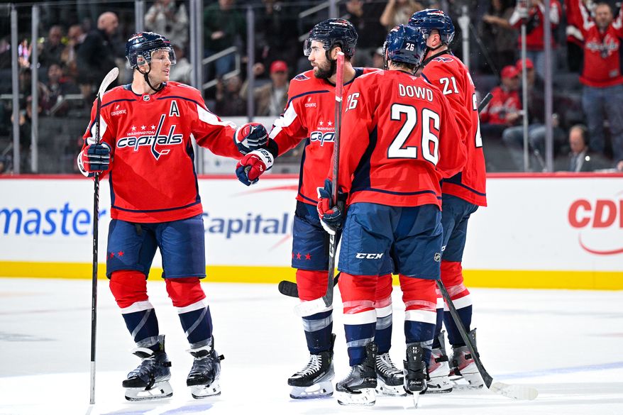 Washington Capitals right wing Tom Wilson (43) celebrates with teammates after scoring an empty-net goal against the Seattle Kraken at Capital One Arena, Washington, D.C., October 21, 2025. (Photo by Brian Murphy for the Washington Times)